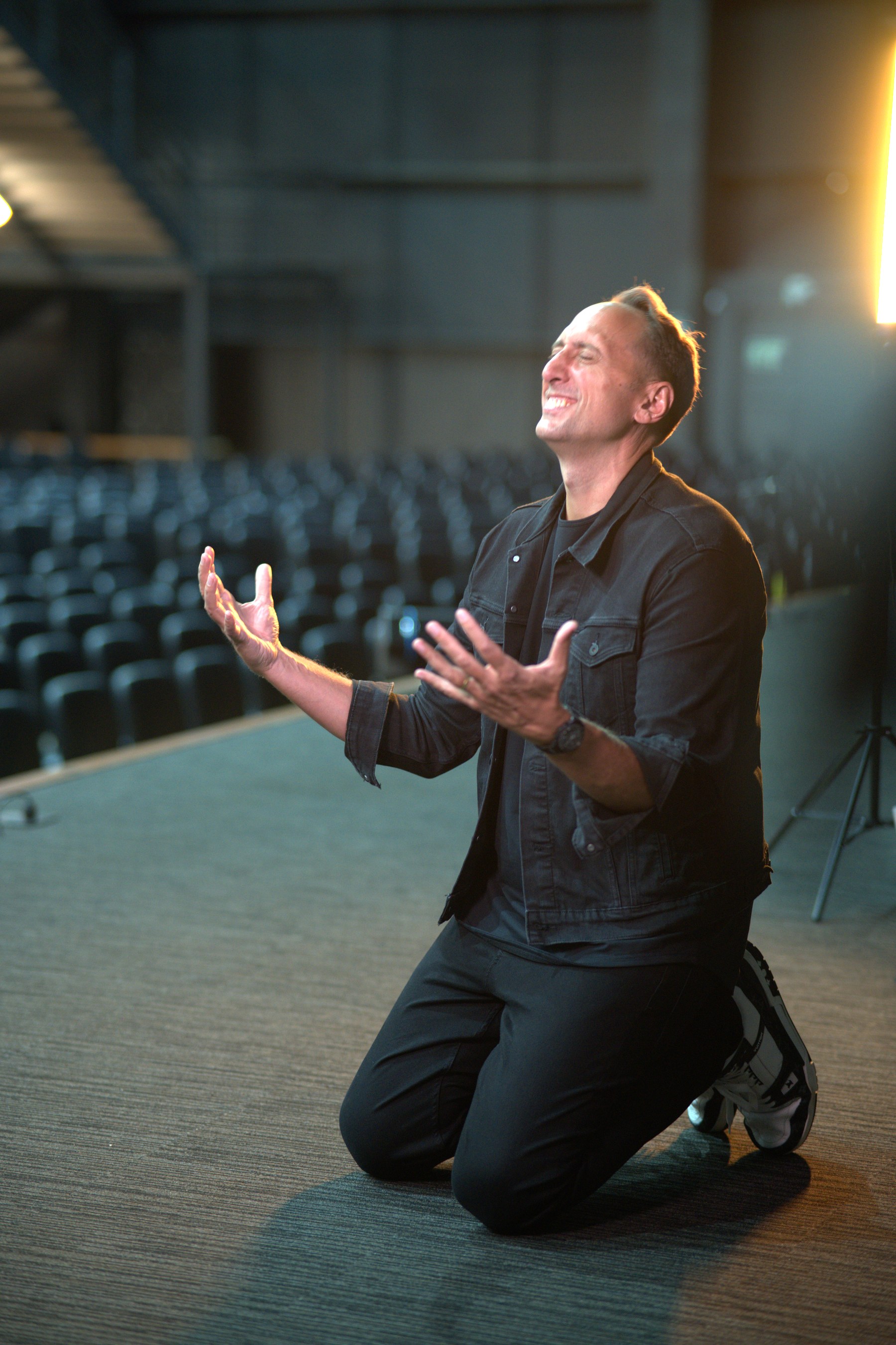 Erik Kingsley speaking on stage